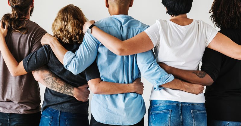 A group of people hugging